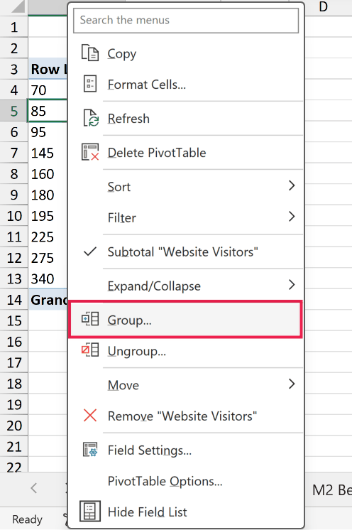 Excel right-click context menu showing the Group option highlighted with a red box
