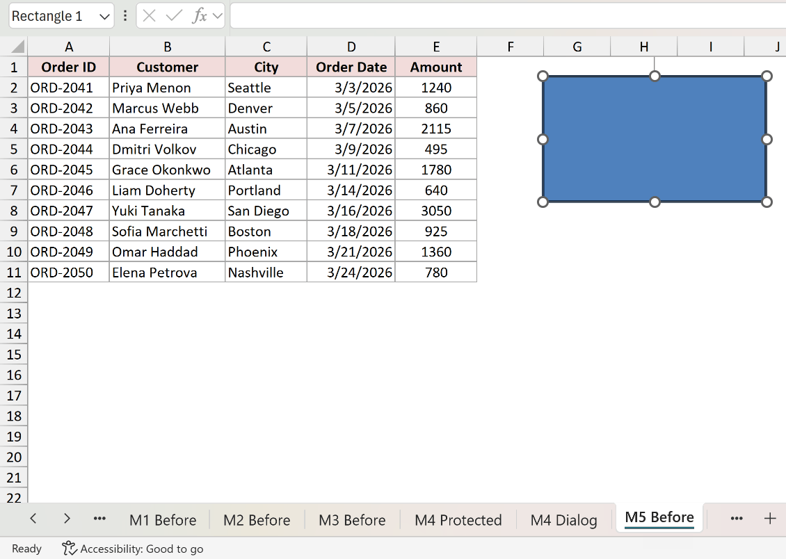 A shape selected on the worksheet with its selection handles showing, the Name Box reading Rectangle 1 instead of a cell address, and the status bar on Ready.