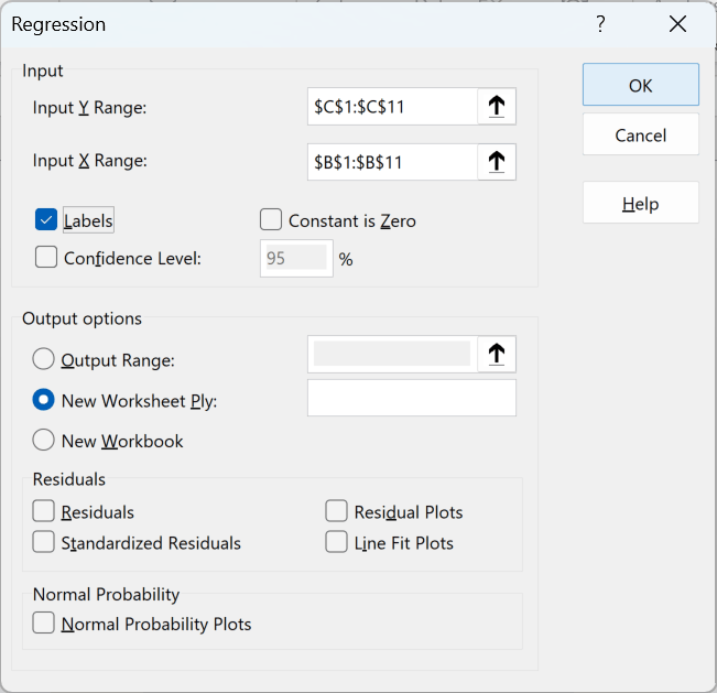 Excel Regression dialog box with Input Y and X ranges defined and the Labels checkbox selected