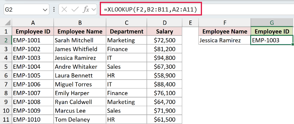 XLOOKUP formula in the formula bar returning EMP-1003 from a column to the left of the lookup column