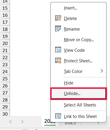 The sheet-tab context menu is open with Unhide highlighted.